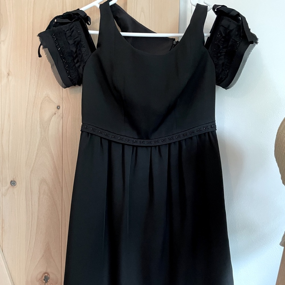 Black above the knee off shoulder dress